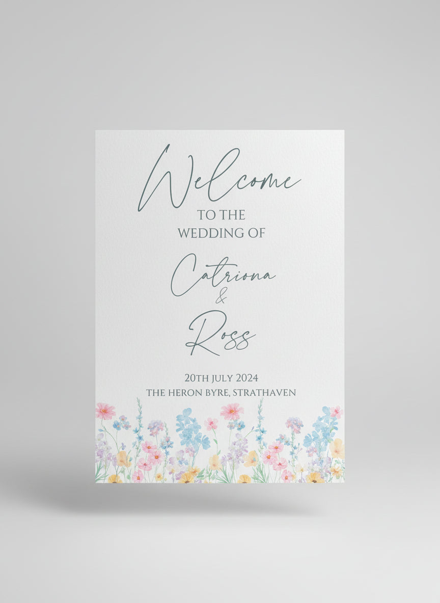 wedding welcome sign with floral design and text.