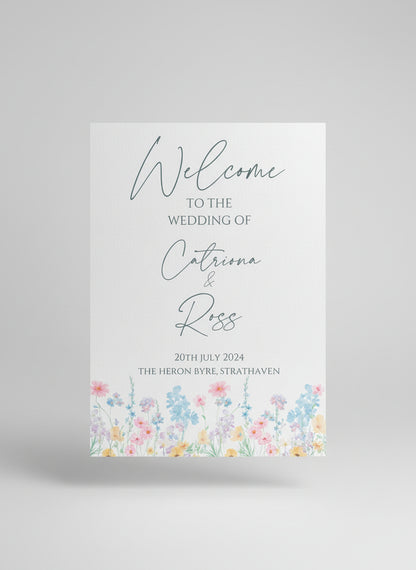 wedding welcome sign with floral design and text.