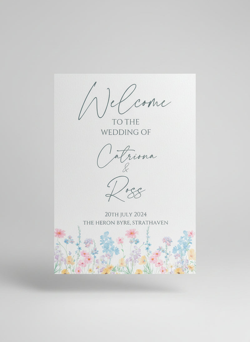 wedding welcome sign with floral design and text.