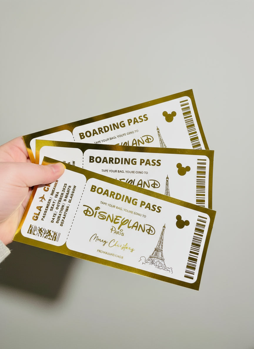 Hand holding multiple boarding pass-style cards with gold and white design.